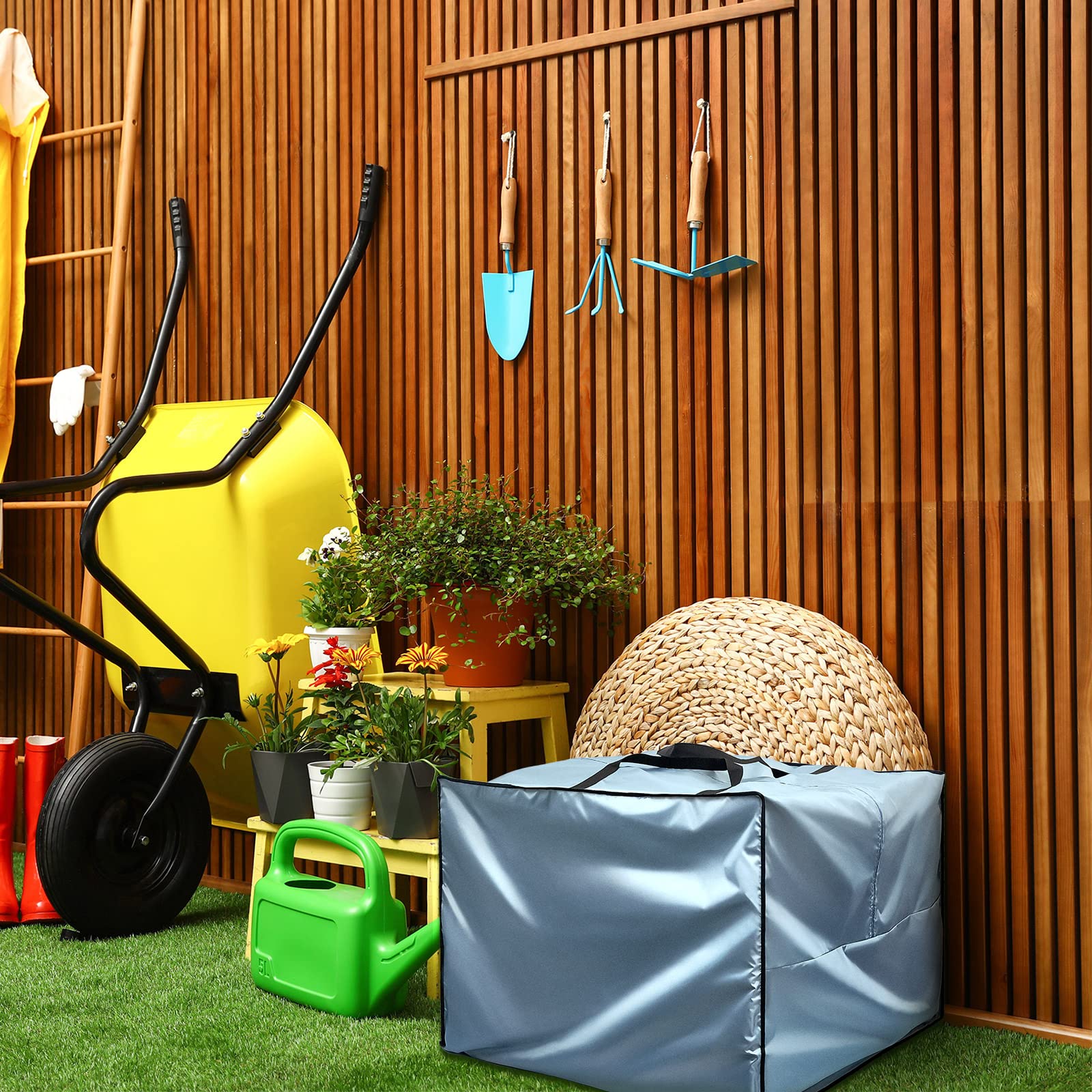 Patelai outdoor cushion storage bag in a garden setting