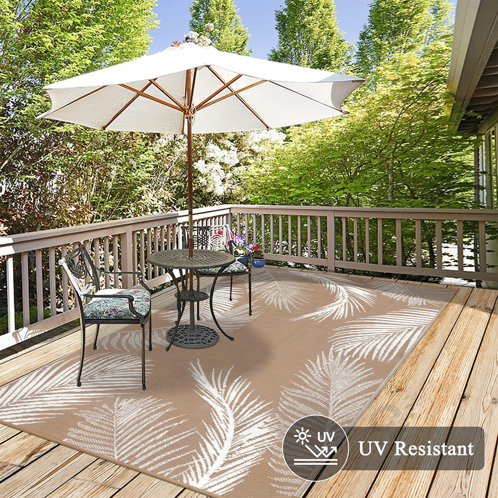 Pauwer Outdoor Rug 5x8 Leaf Brown on patio