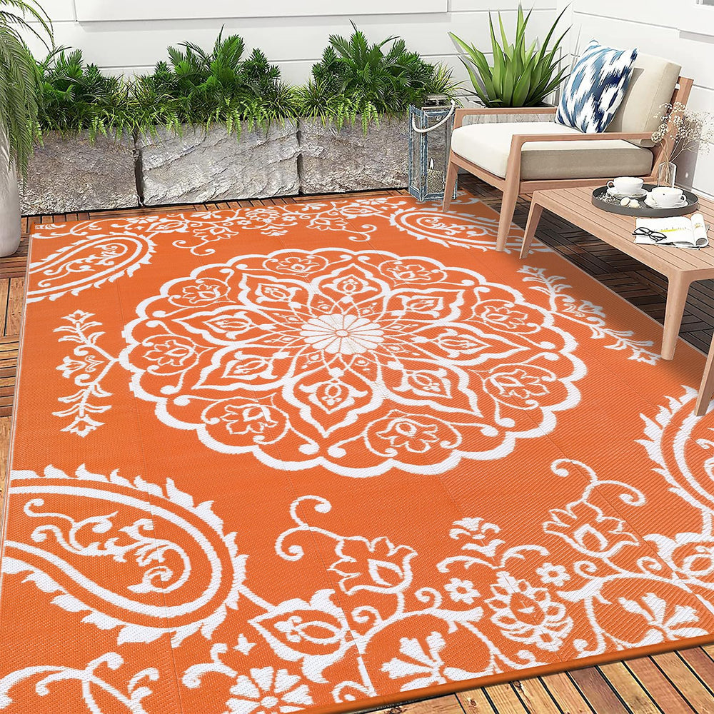 Pauwer Outdoor Rug 6' x 9' Boho Orange with rug stakes