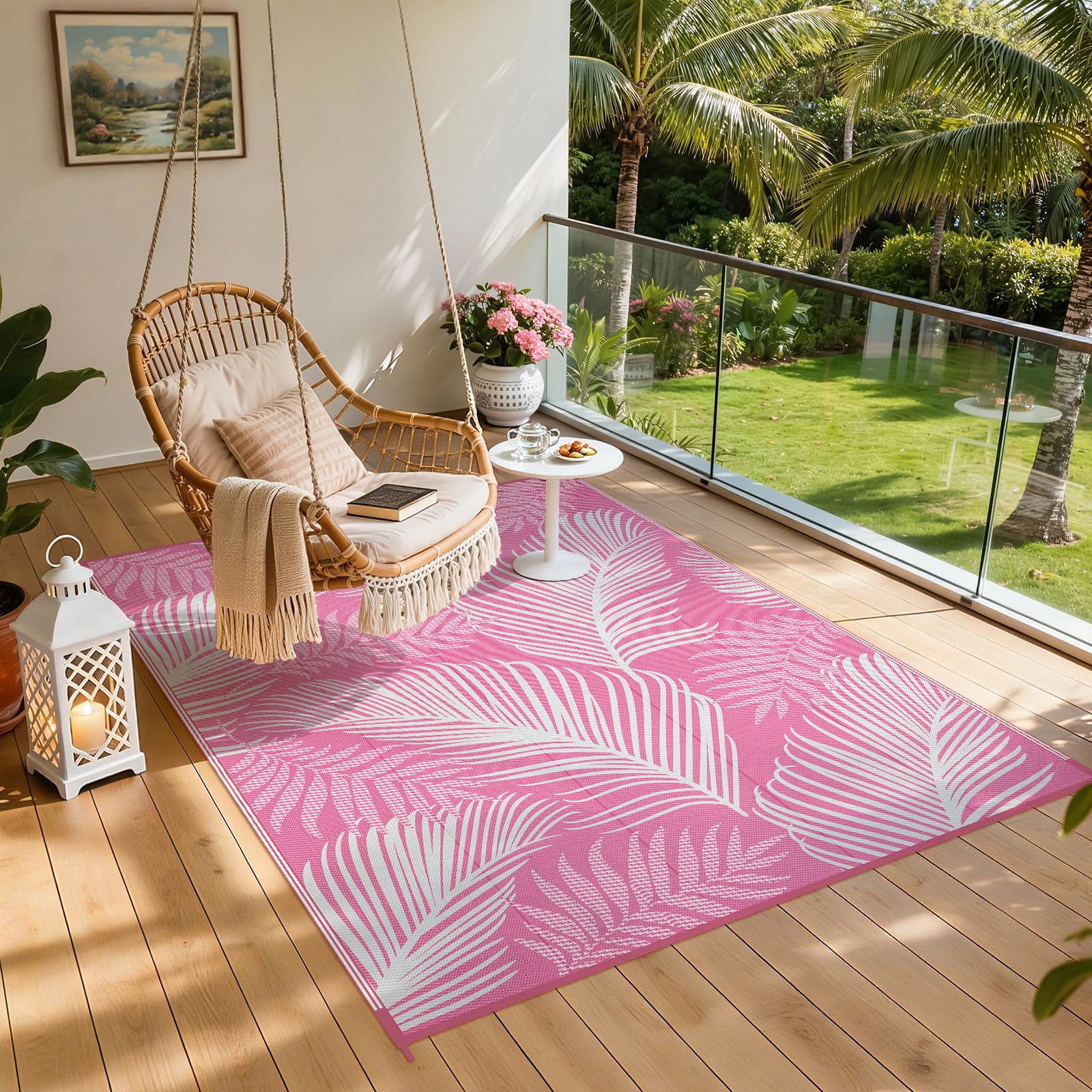 Pauwer Outdoor Rug 6' x 9' Leaf Pink secured with stakes