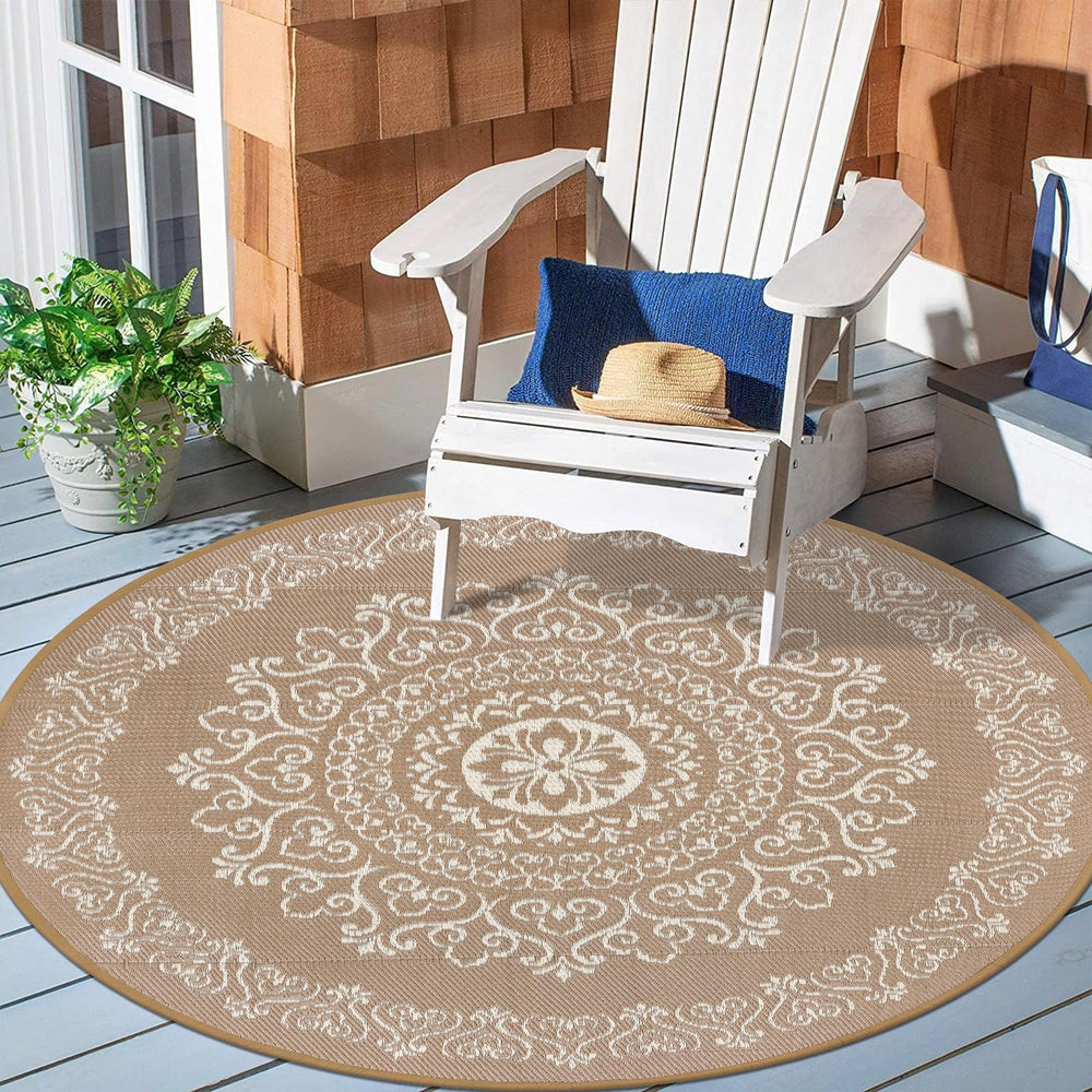 Pauwer Outdoor Rug 6ft round in a patio setting with furniture