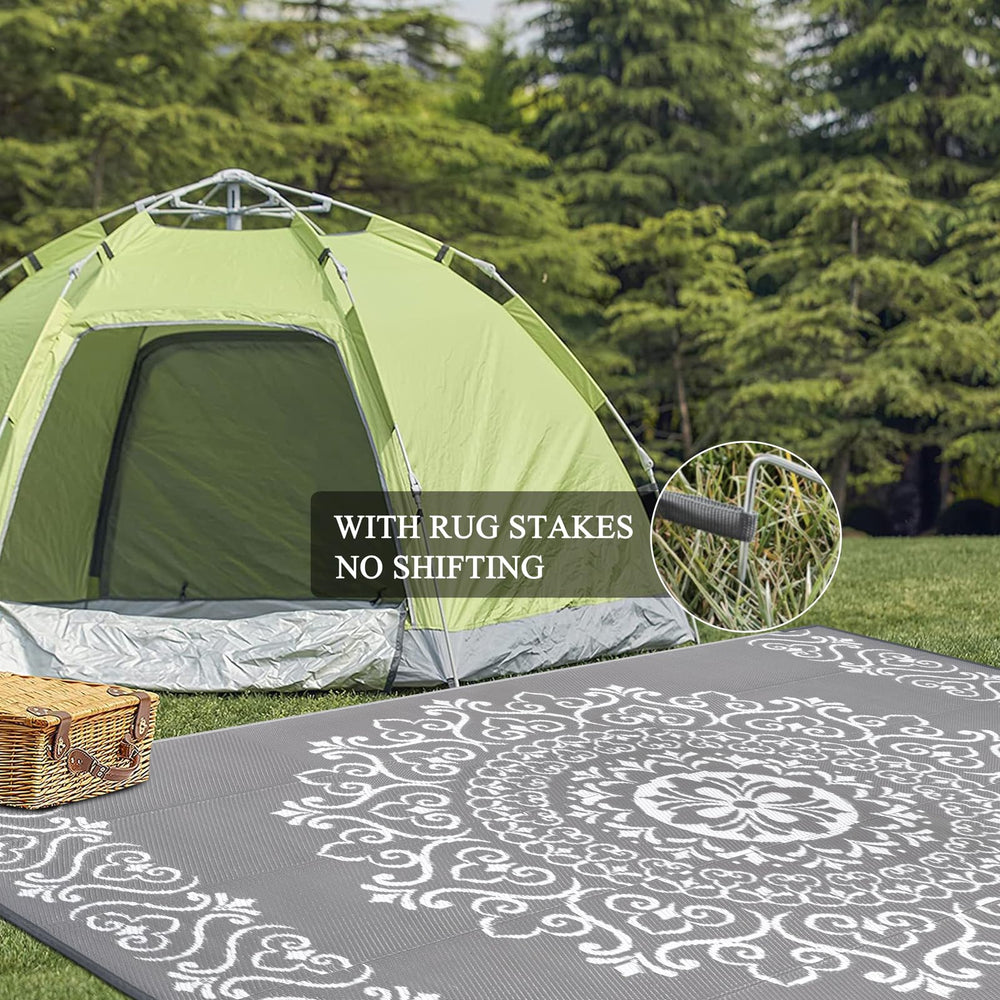 Pauwer Outdoor Rug 8x10 Floral Grey at the beach