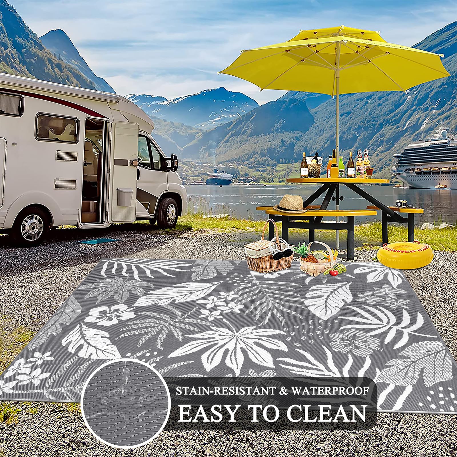 Pauwer Outdoor Rug 8x10 Floral Grey cleaning with a hose