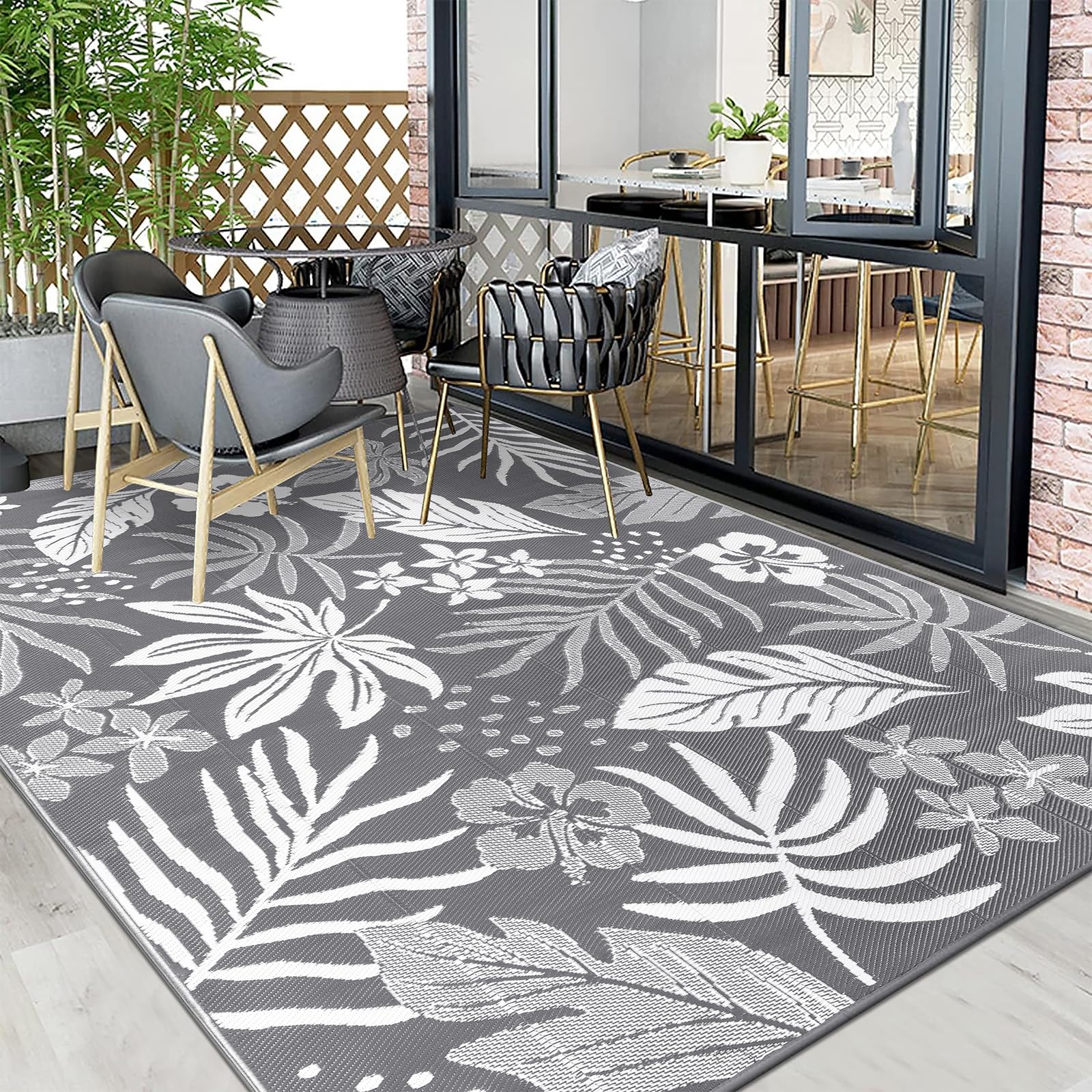Pauwer Outdoor Rug 8x10 Floral Grey in a picnic setup