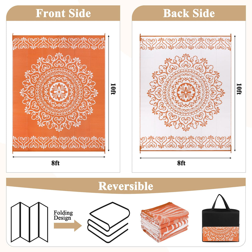 Pauwer Outdoor Rug 8x10 Floral Orange in garden setting