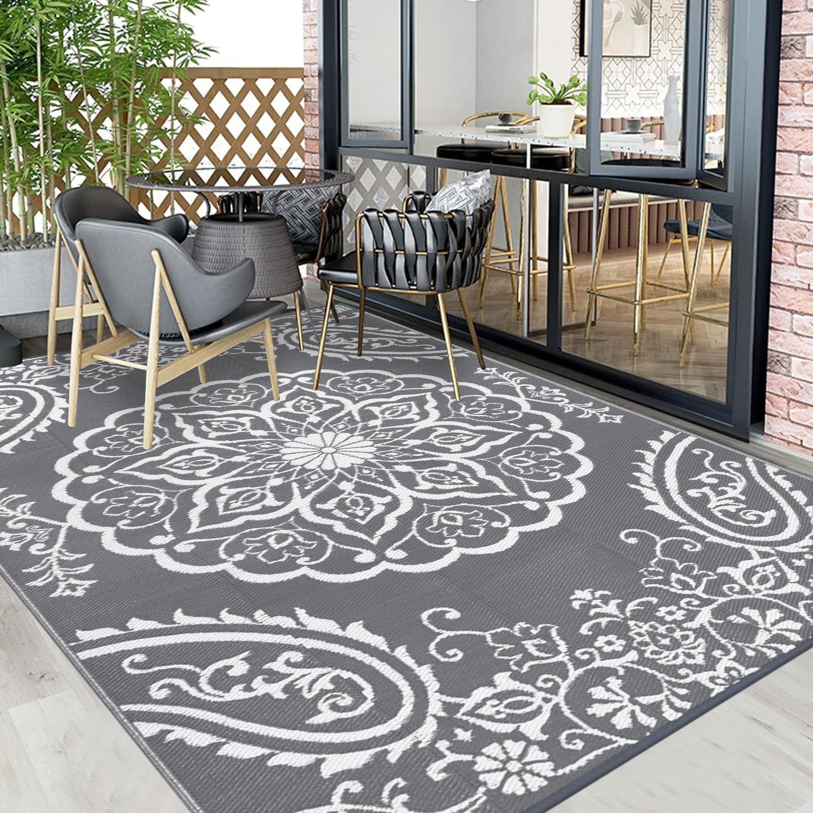 Pauwer Outdoor Rug 8x10 in garden setting