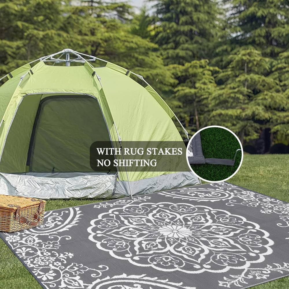 Pauwer Outdoor Rug 8x10 secured with rug stakes