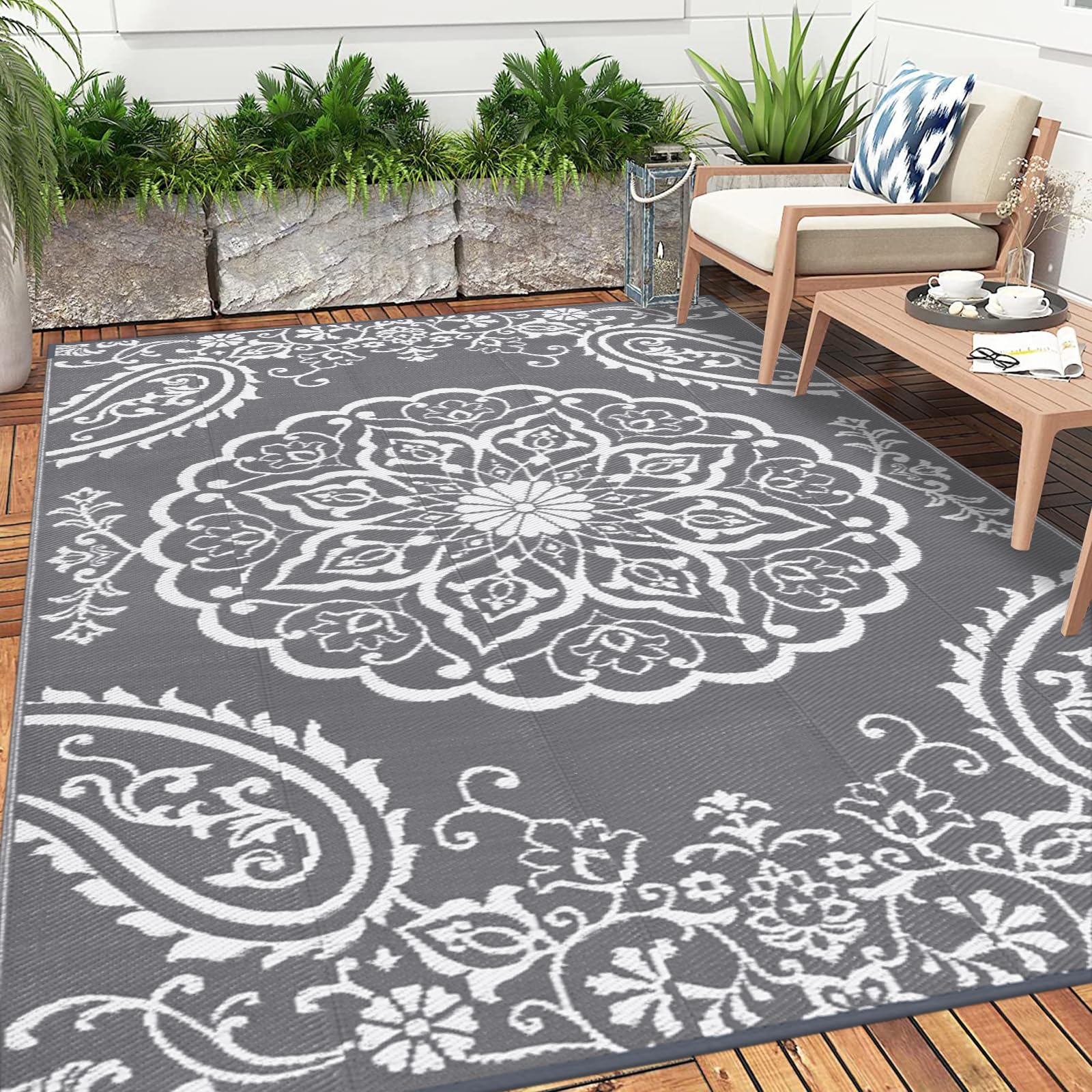 Pauwer Outdoor Rug 8x10 showing waterproof feature with water droplets