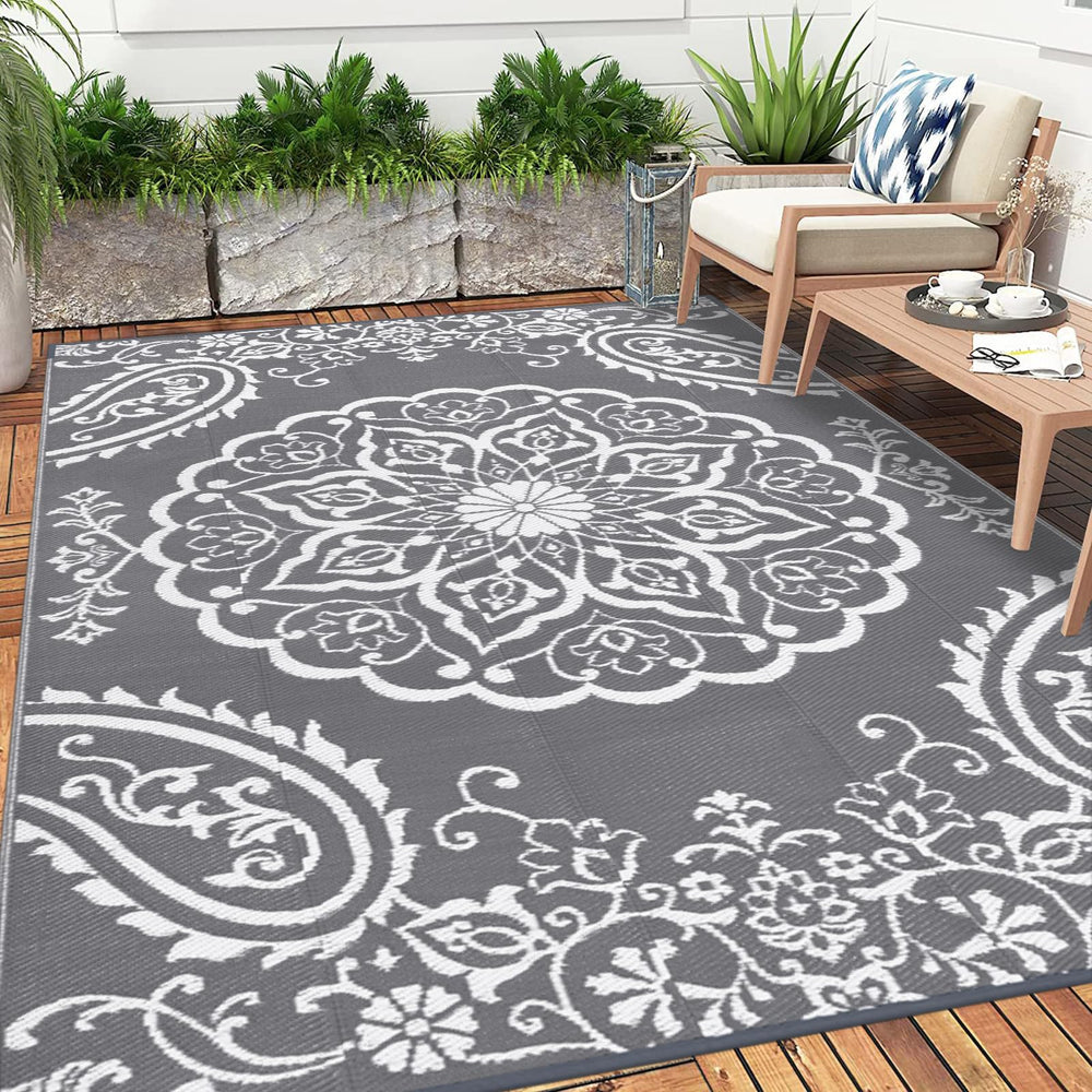 Pauwer Outdoor Rug 8x10 showing waterproof feature with water droplets