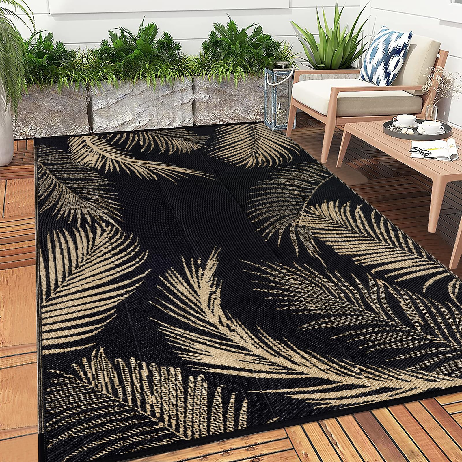 Pauwer Outdoor Rug 8x10 with rug stakes on grass