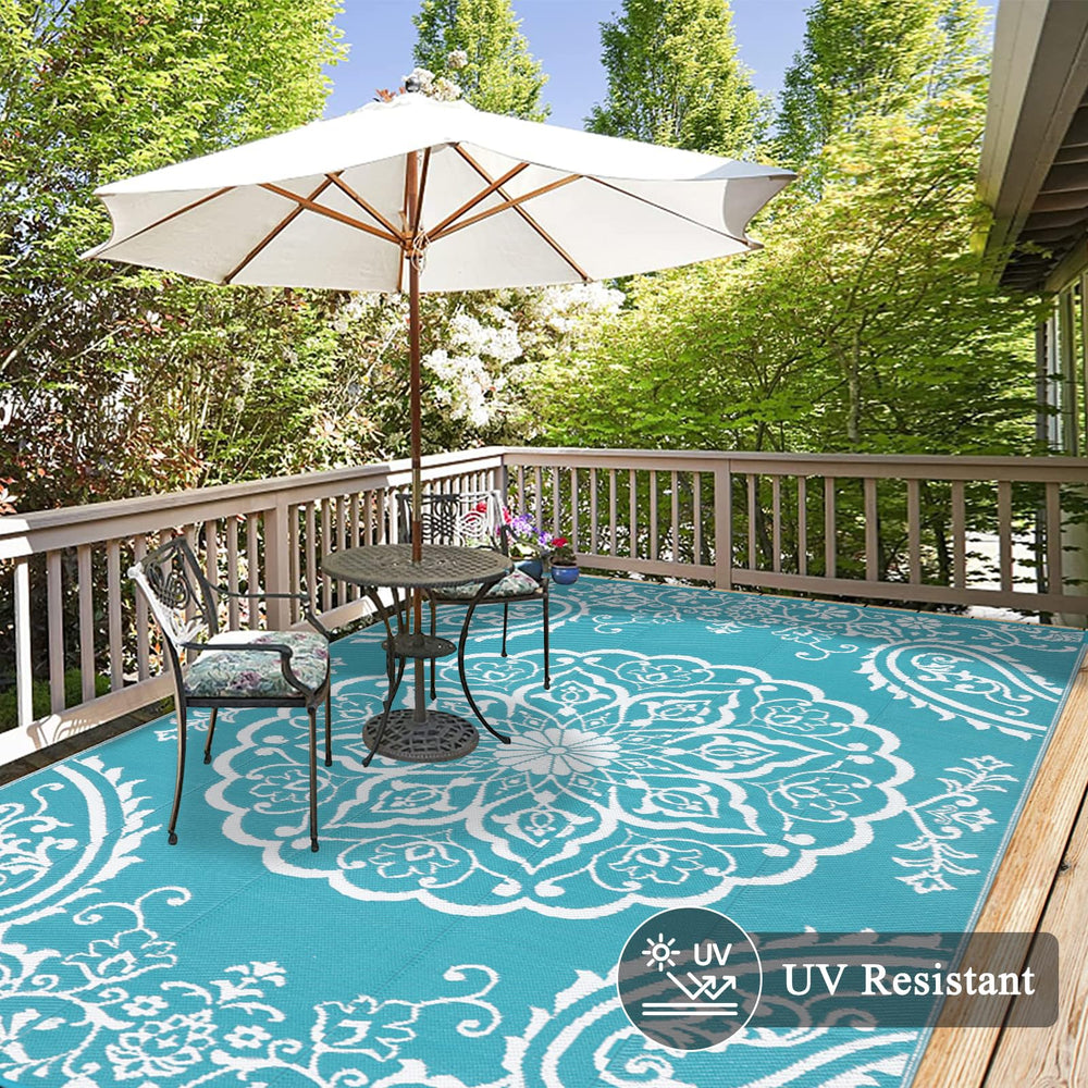 Pauwer Outdoor Rug 9x12 in outdoor setting