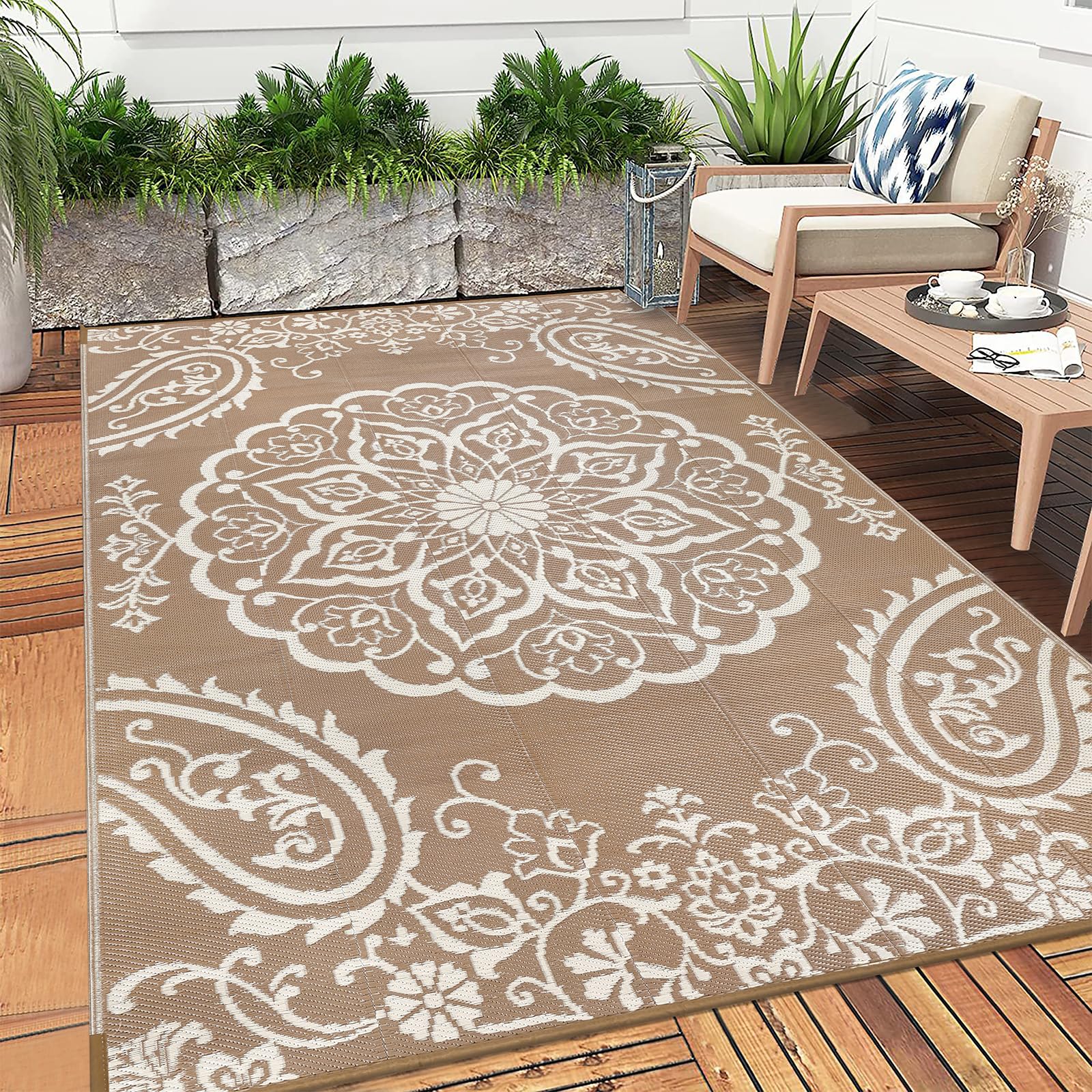 Pauwer Outdoor Rug displayed in a garden