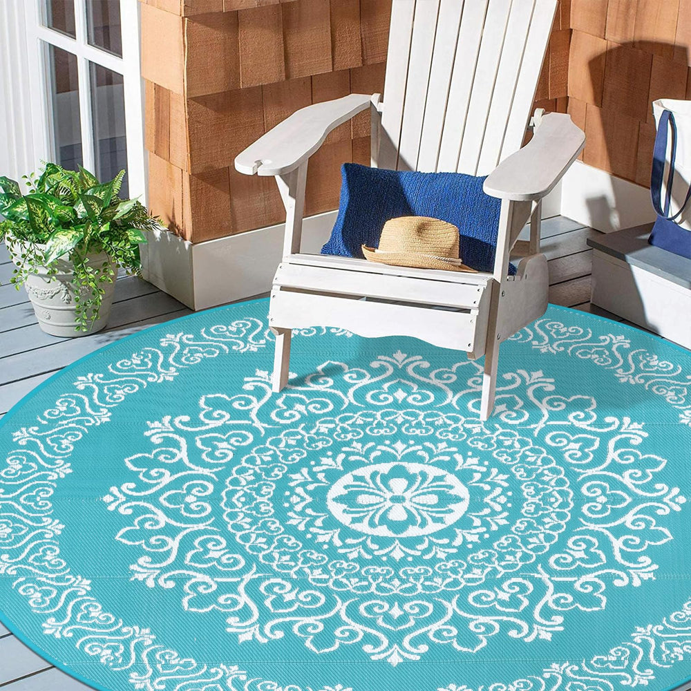 Pauwer Outdoor Rug displayed on a beach setting