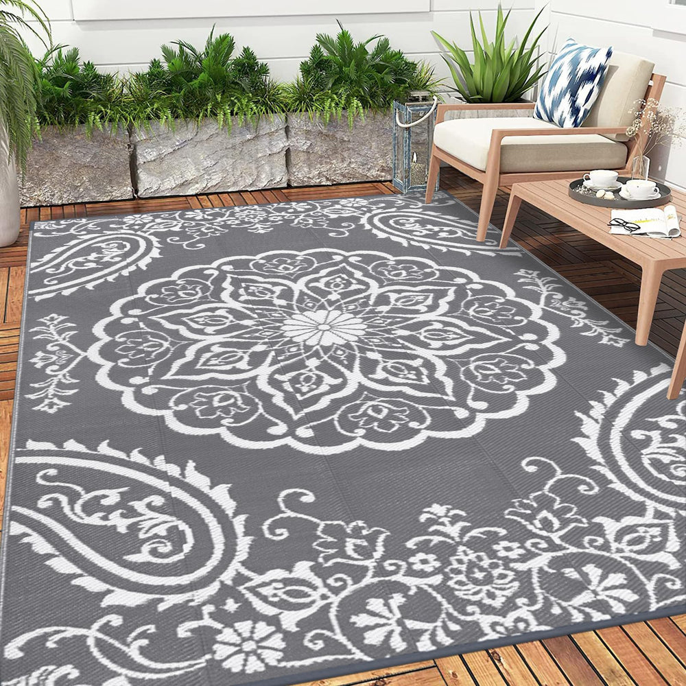 Pauwer Outdoor Rug on patio with furniture