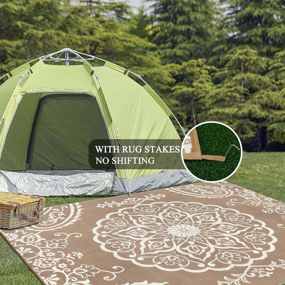 Pauwer Outdoor Rug with stakes for secure placement