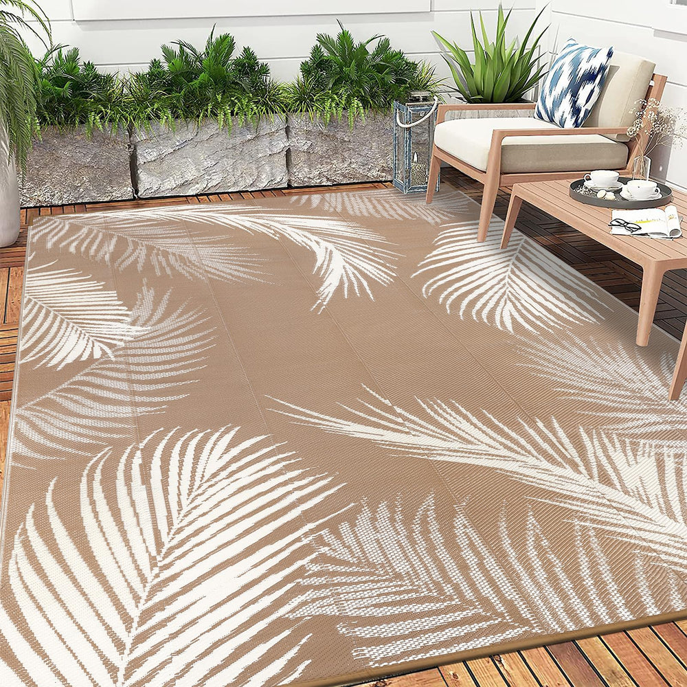 Pauwer Outdoor Rug with stakes for secure placement