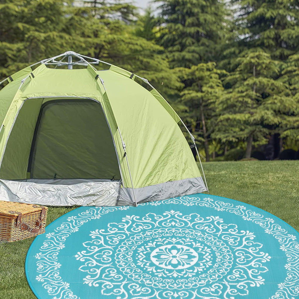 Pauwer Outdoor Rug with stakes for secure placement