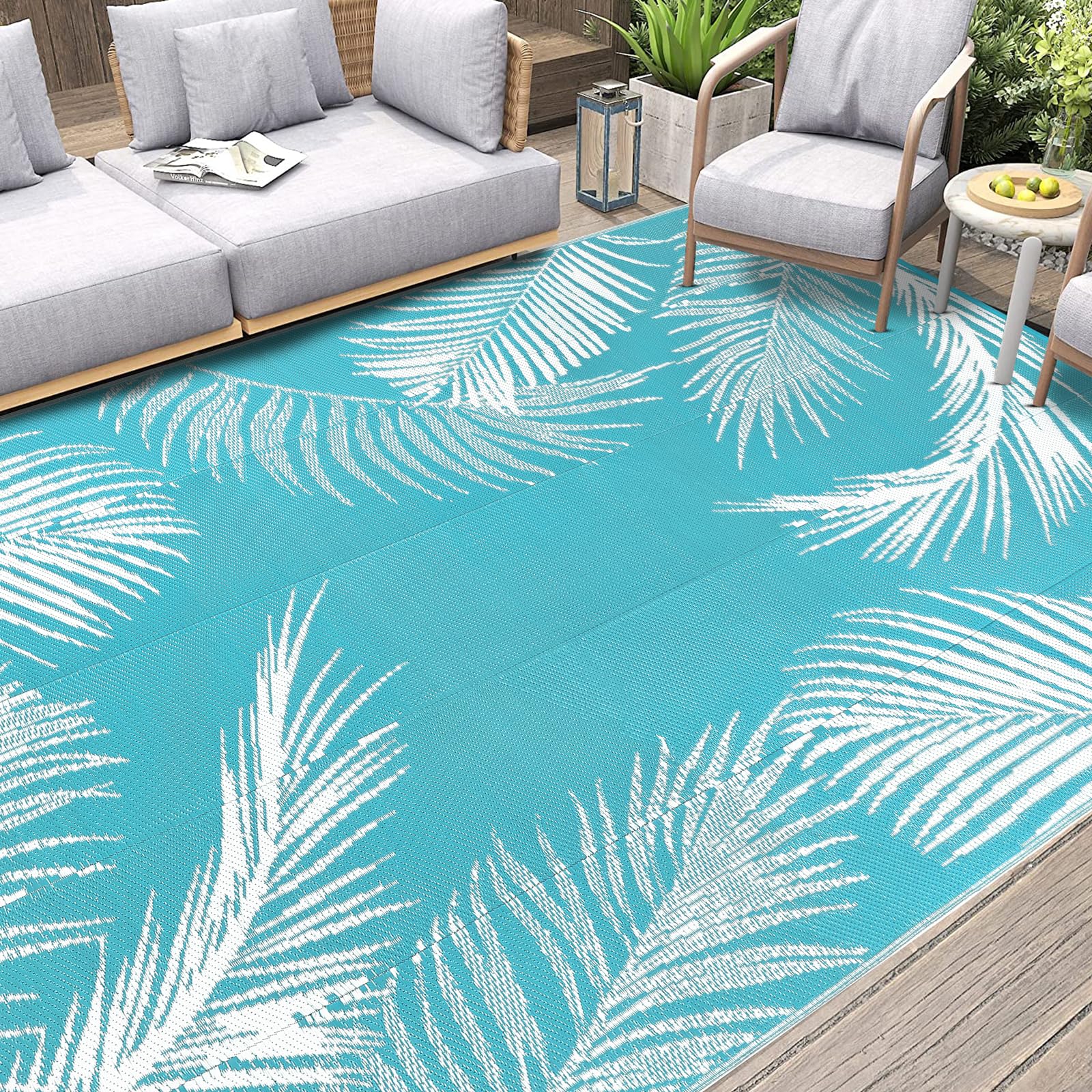 Pauwer Waterproof Outdoor Rug 6x9 Leaf Teal close-up of texture