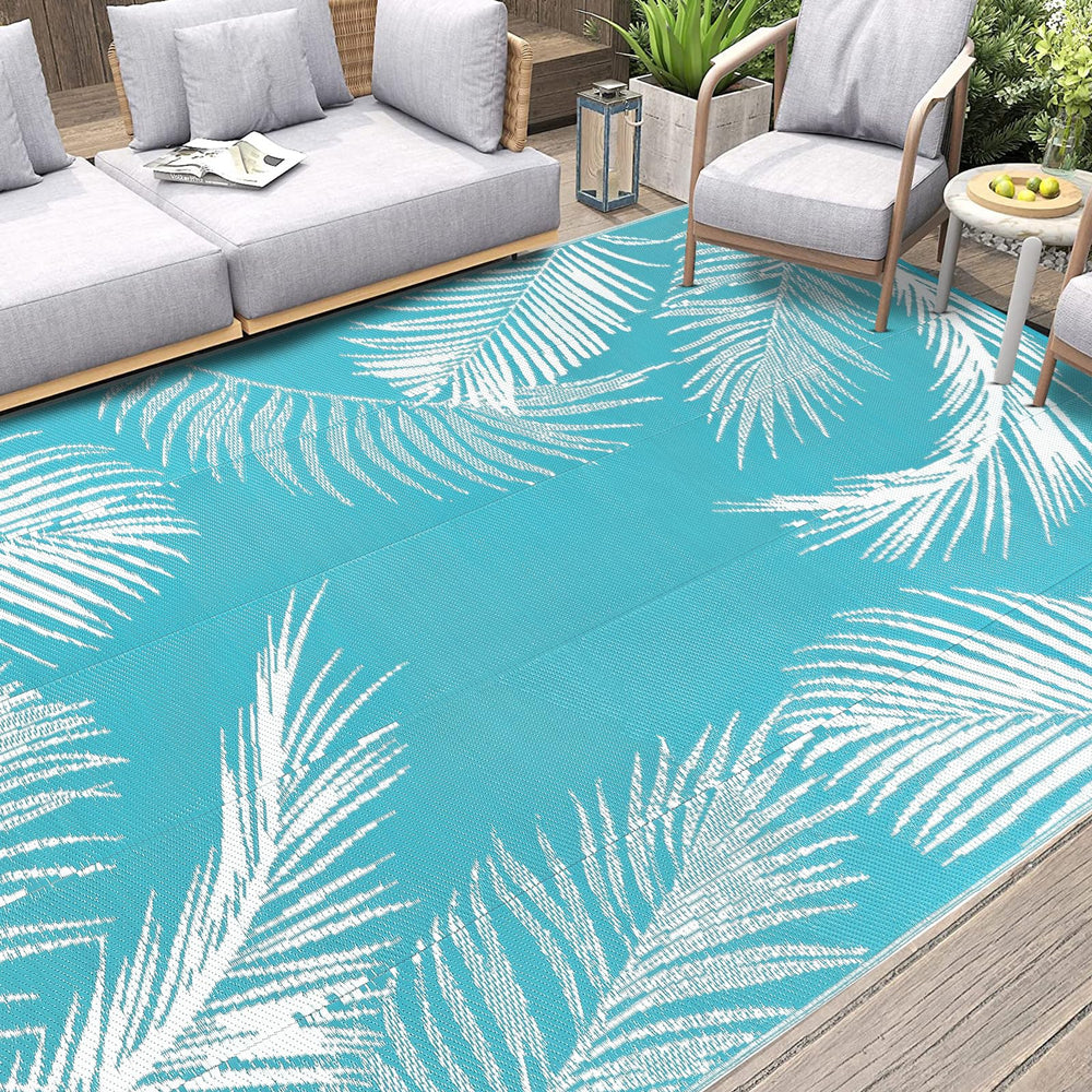Pauwer Waterproof Outdoor Rug 6x9 Leaf Teal close-up of texture