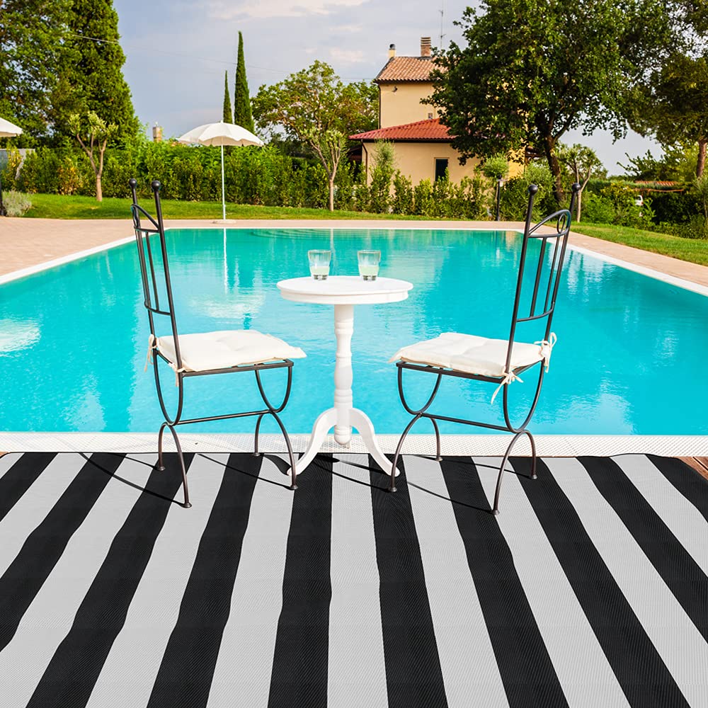Pcinfuns outdoor rug with edging detail