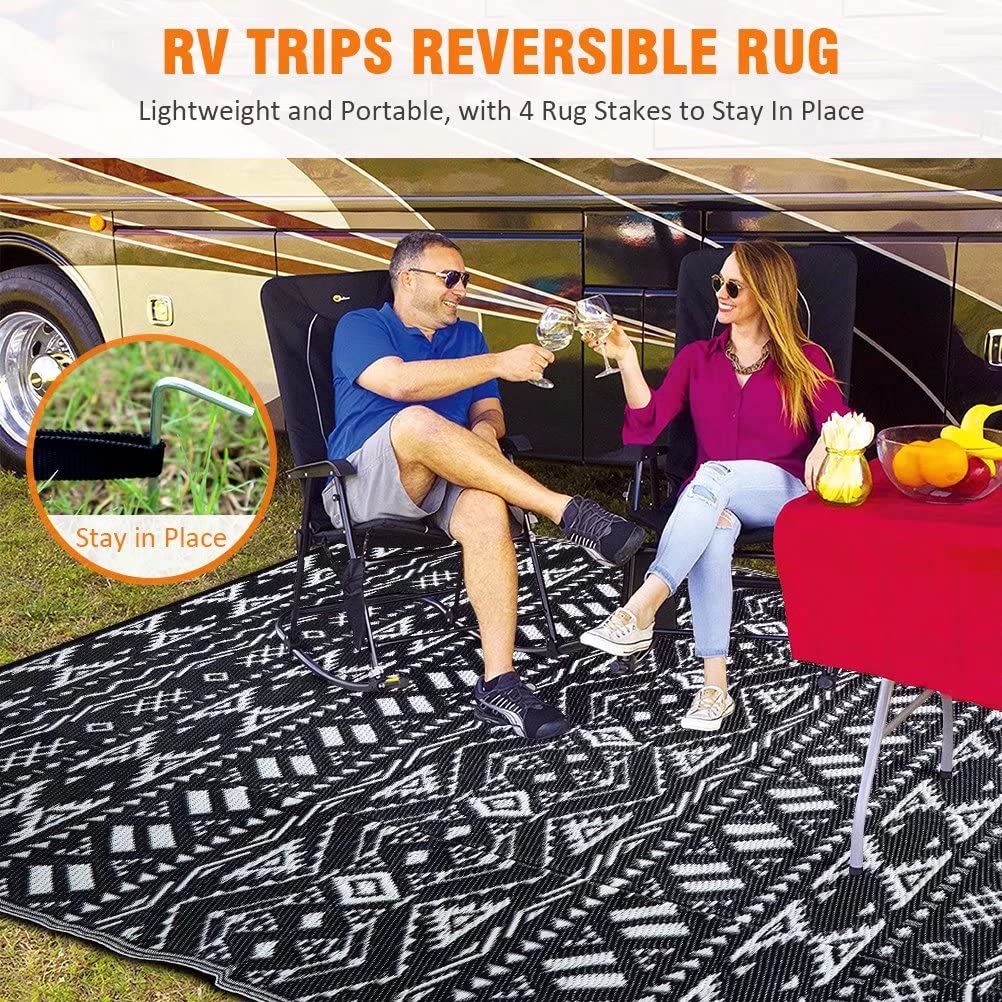 Pendolr Outdoor Rug 9'x12' laid out at a beach