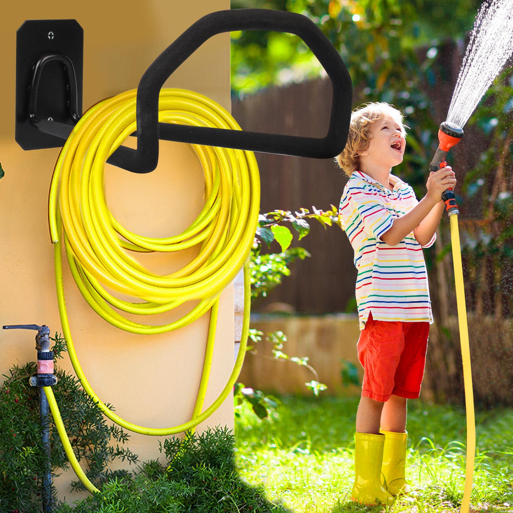 PeoMev Garden Hose Holder mounted on wooden fence