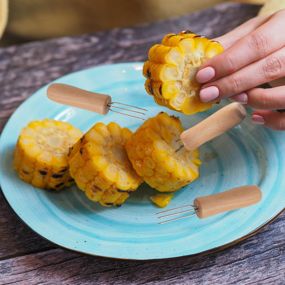 PEOUWNES corn holders laid out on a picnic table