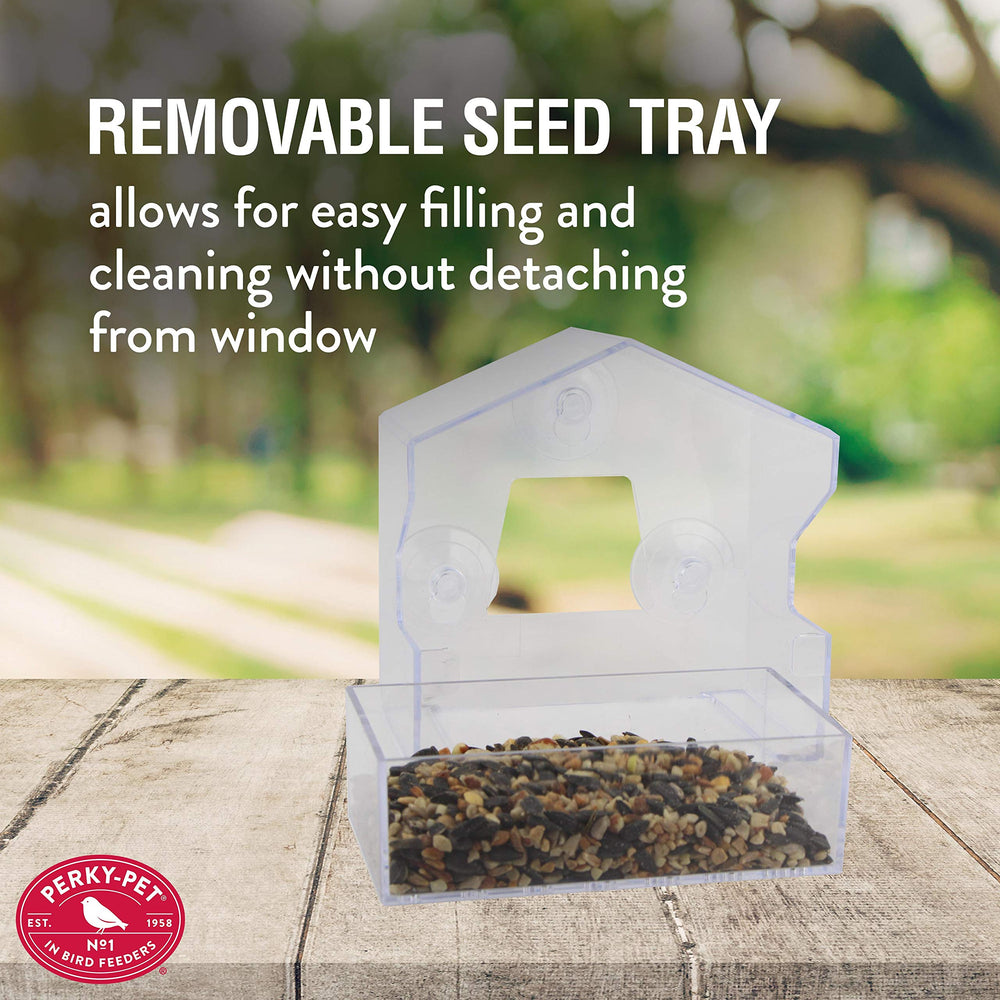 Perky-Pet Window Bird Feeder in a garden setting