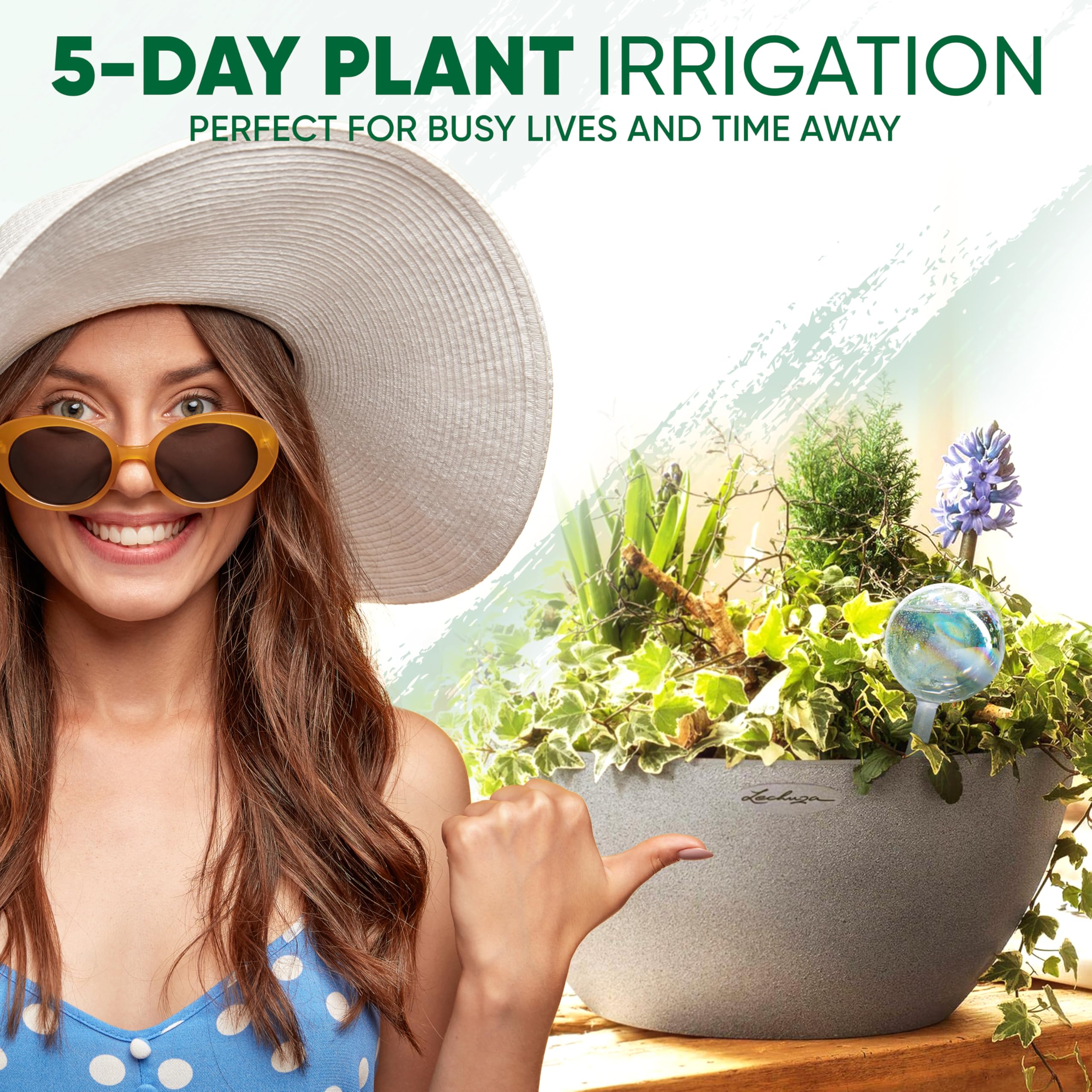 Person using Mission Gallery watering globe in indoor plant