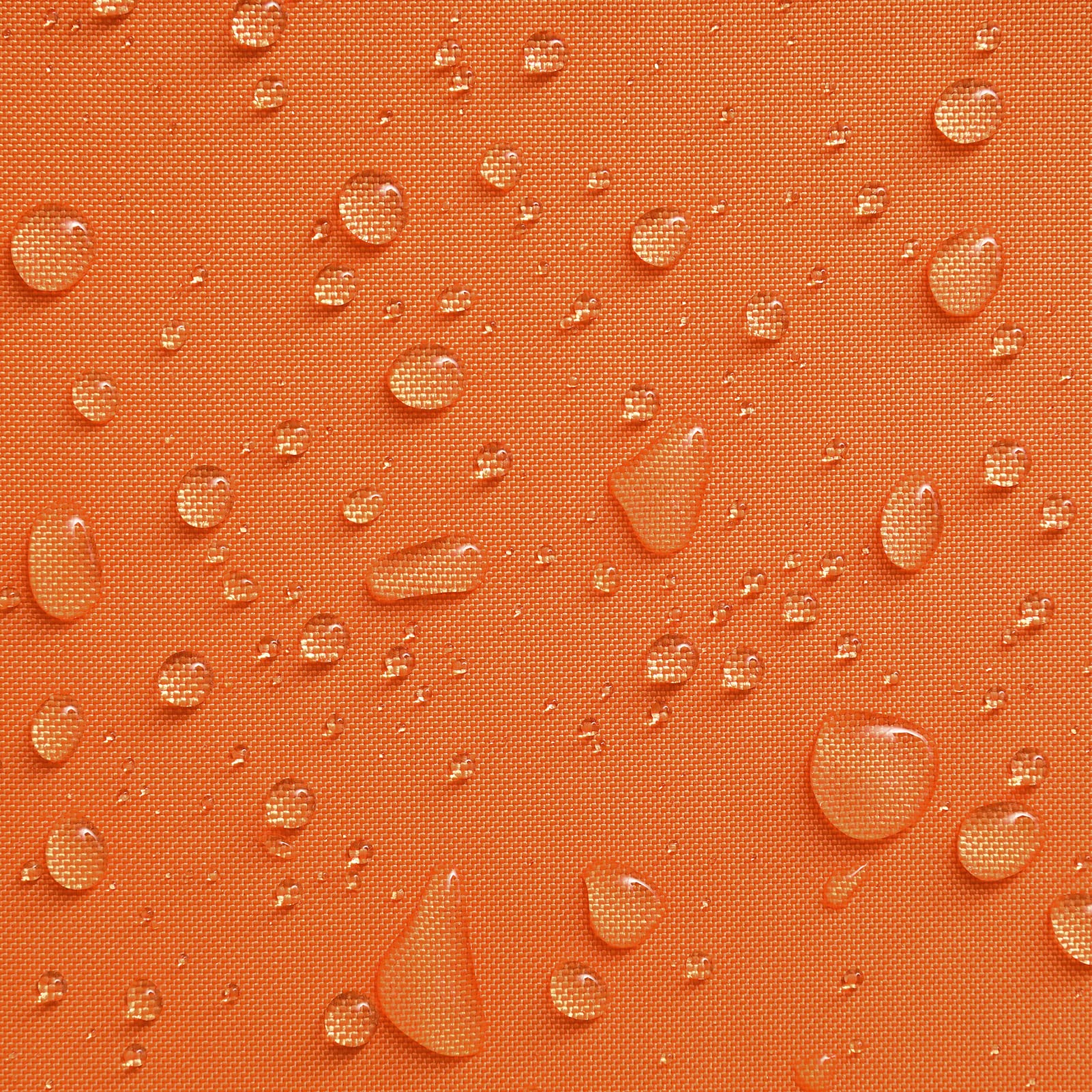 Phantoscope orange pillow cover displayed on a sofa