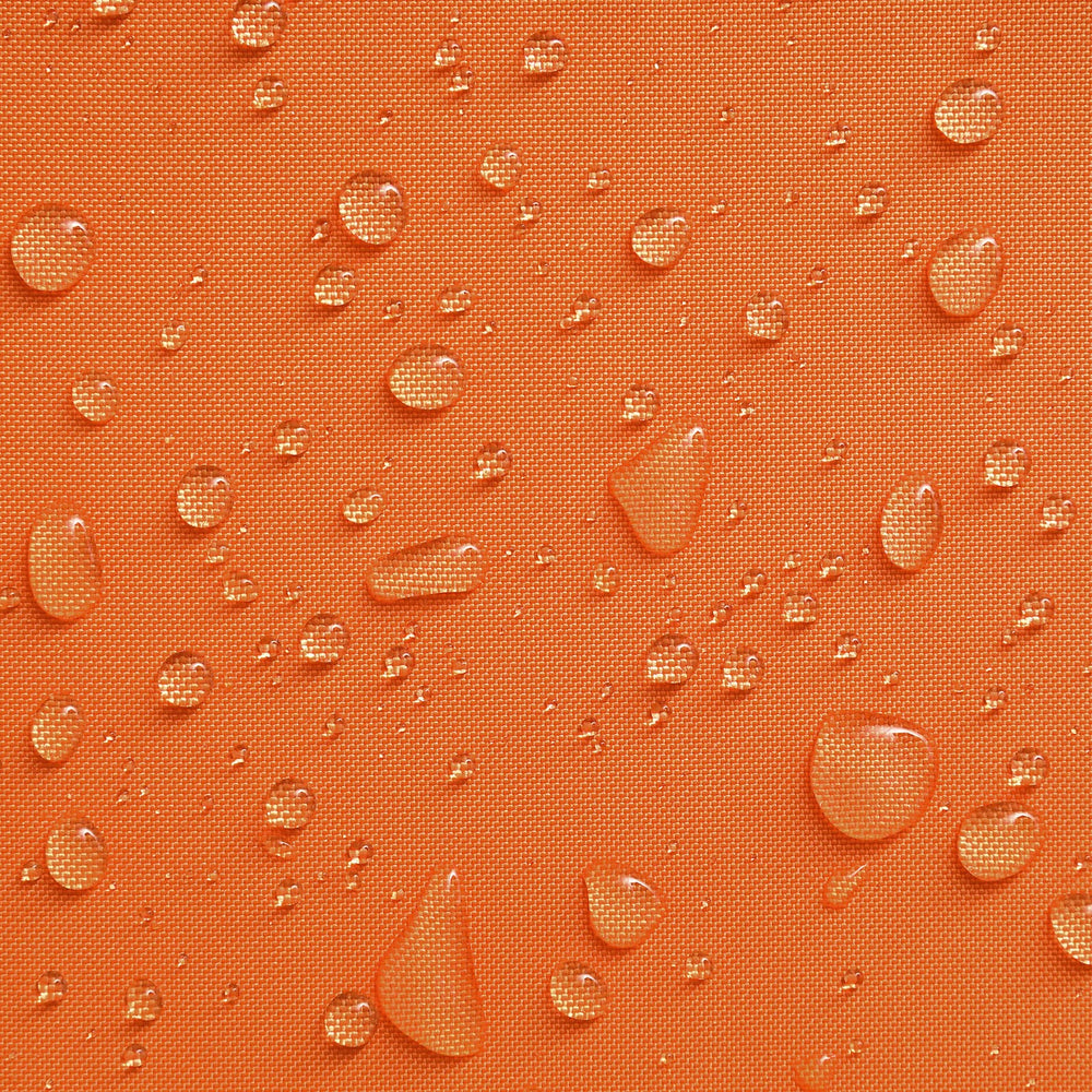 Phantoscope orange pillow cover displayed on a sofa