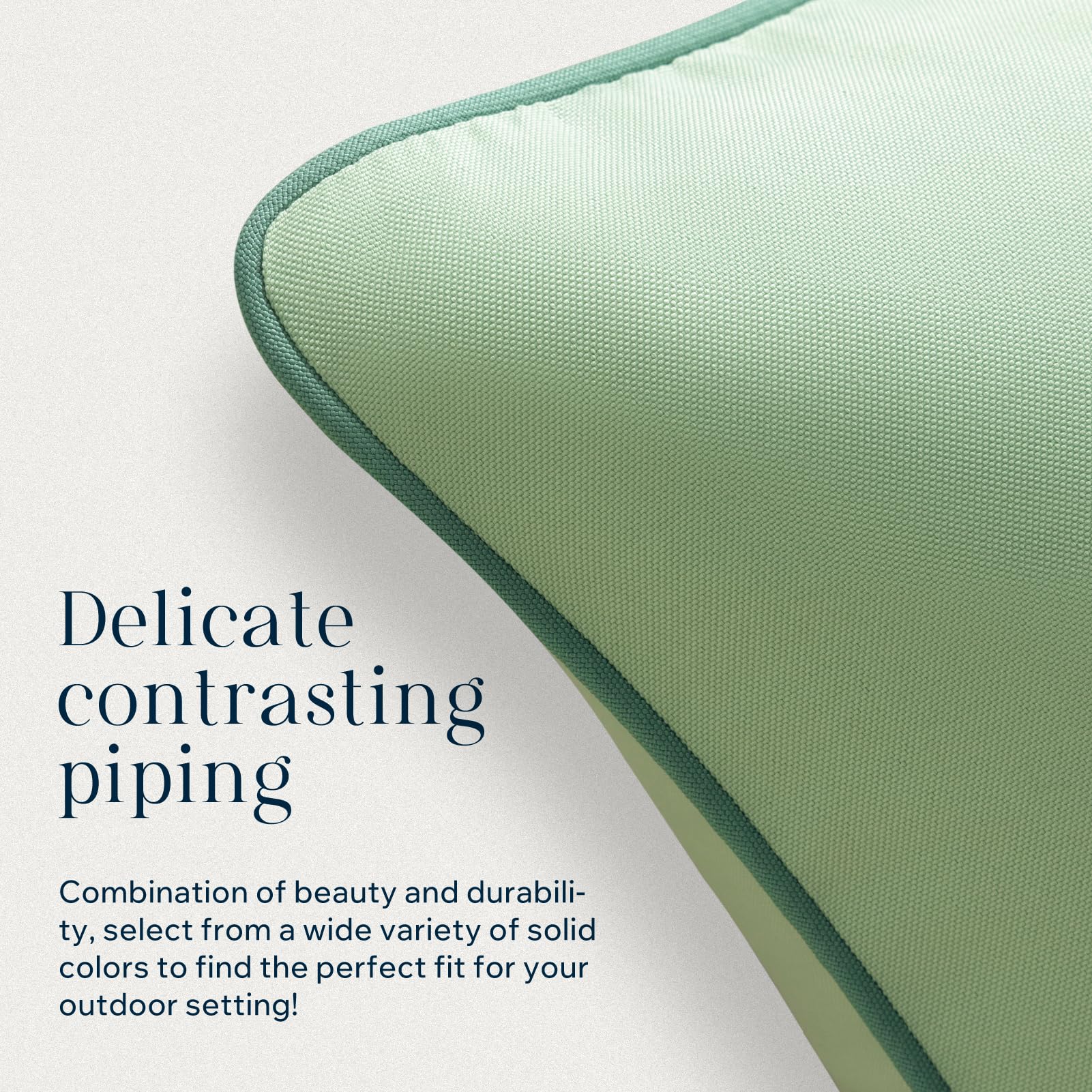 Phantoscope outdoor pillow cover sage green displayed on a garden bench