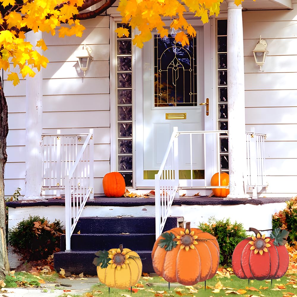 PHITRIC pumpkin garden stakes arranged in a lawn