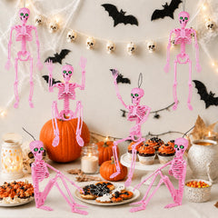 Pink skeleton hanging from a tree outdoors