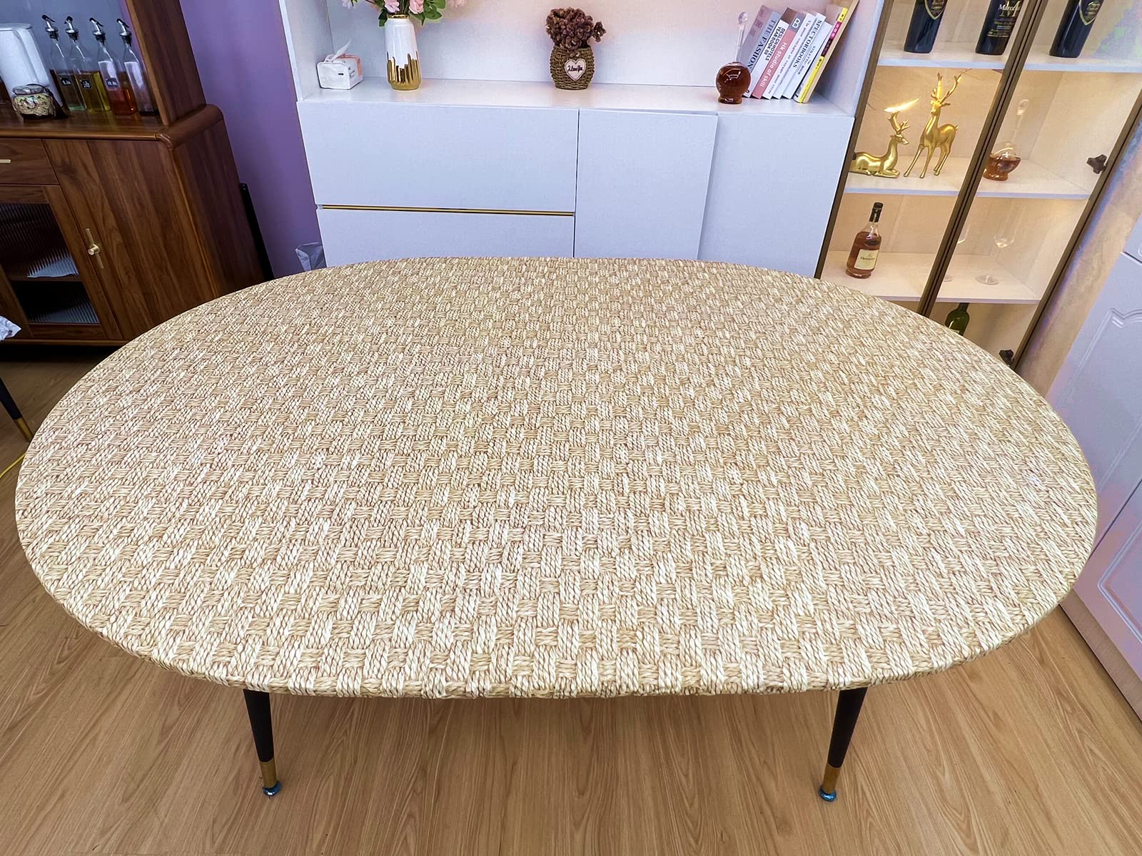 Pioggia Oval Tablecloth showing elastic edges for secure fit