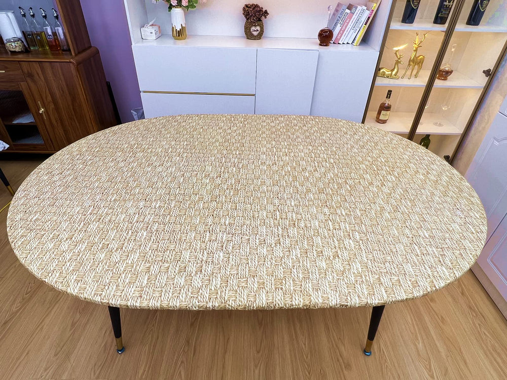Pioggia Oval Tablecloth showing elastic edges for secure fit