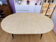 Pioggia Oval Tablecloth showing elastic edges for secure fit
