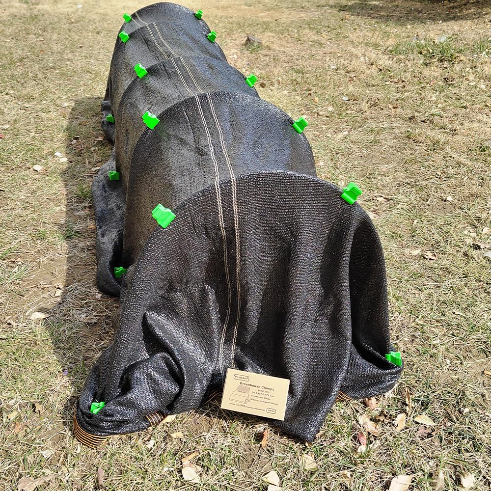 PirateAnt Greenhouse Clamp demonstrating secure hold on plant cover