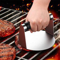 Pisol Smash Burger Press on a grill with patties