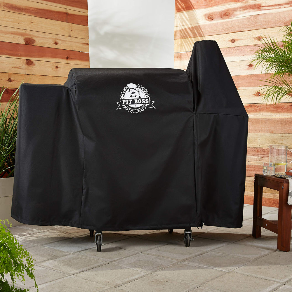 PIT BOSS Deluxe Grill Cover in a weather environment, showcasing its weather resistance