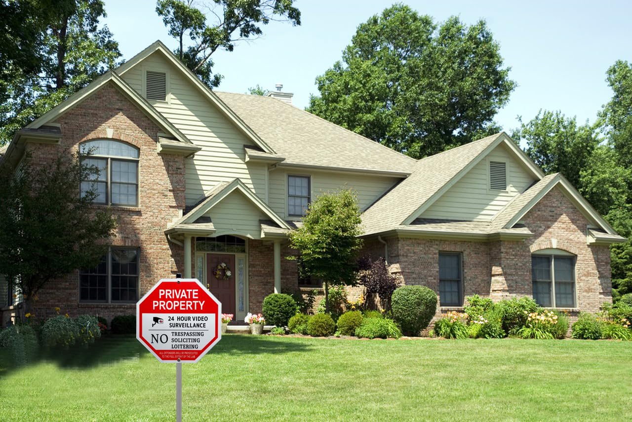 Poicrm No Loitering yard sign with stake in grass