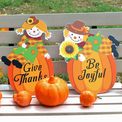 POILKMNI scarecrow yard sign with stakes in garden