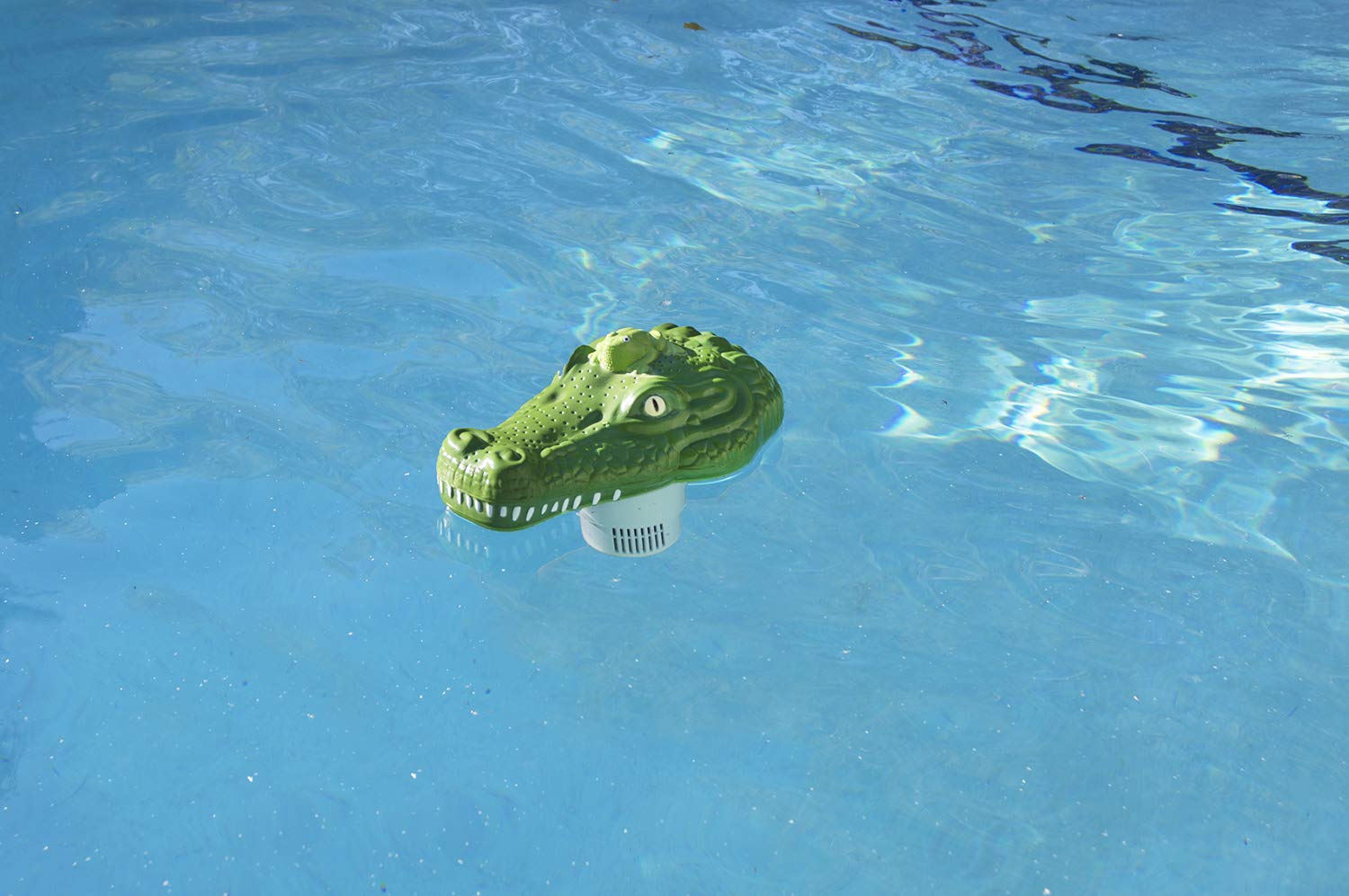 Poolmaster Chlorine Dispenser floating in a pool