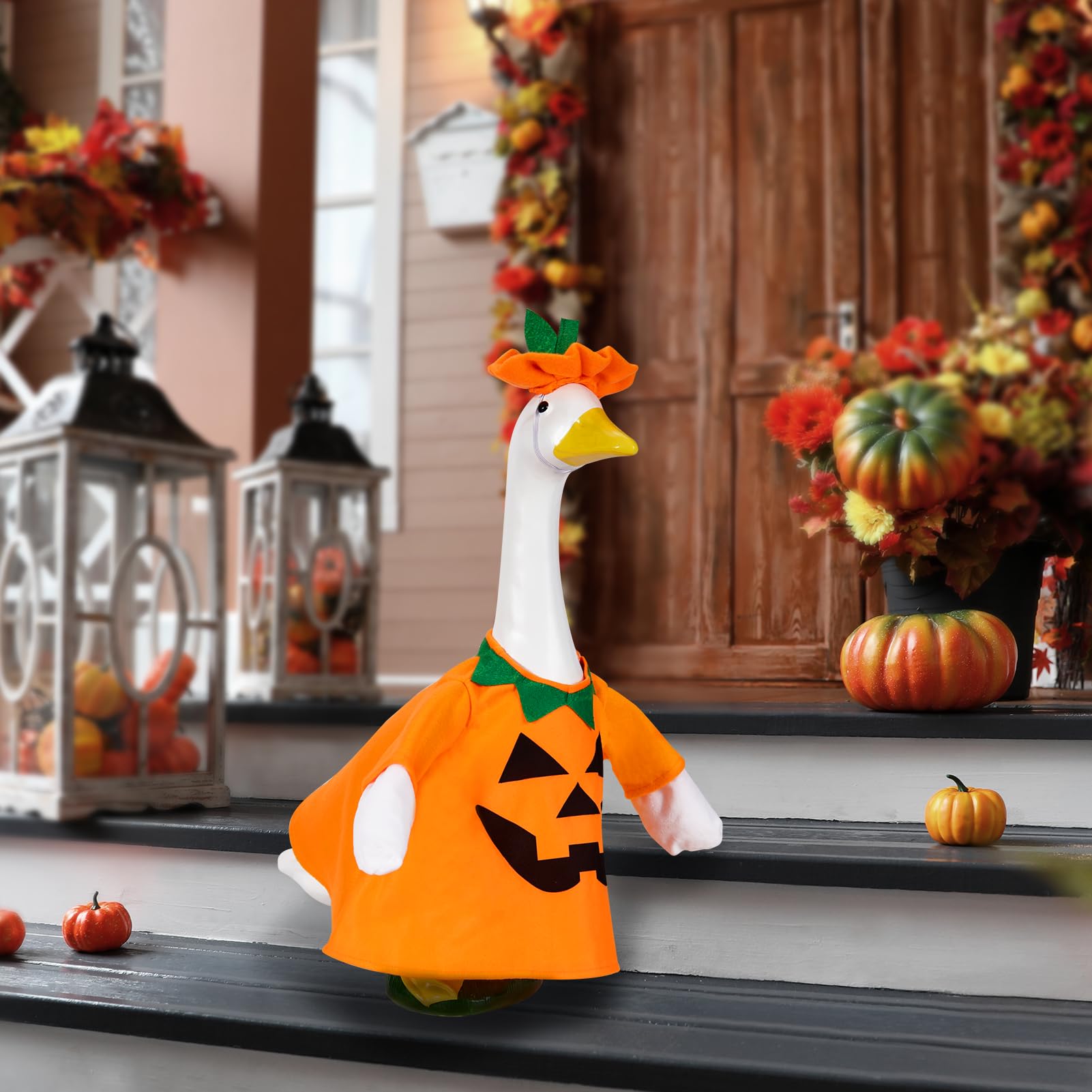 Porch goose dressed in Christmas costume with Santa Claus
