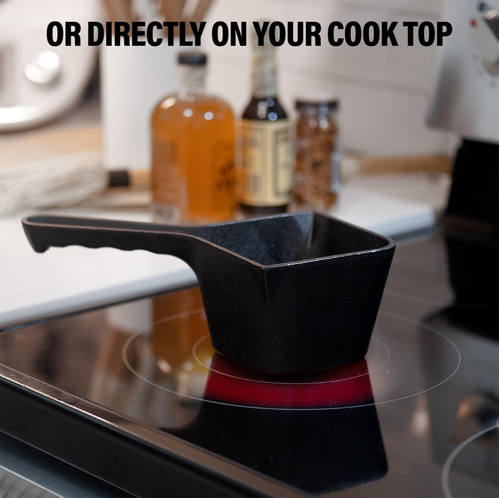 Pre-seasoned cast iron basting pot ready for grilling