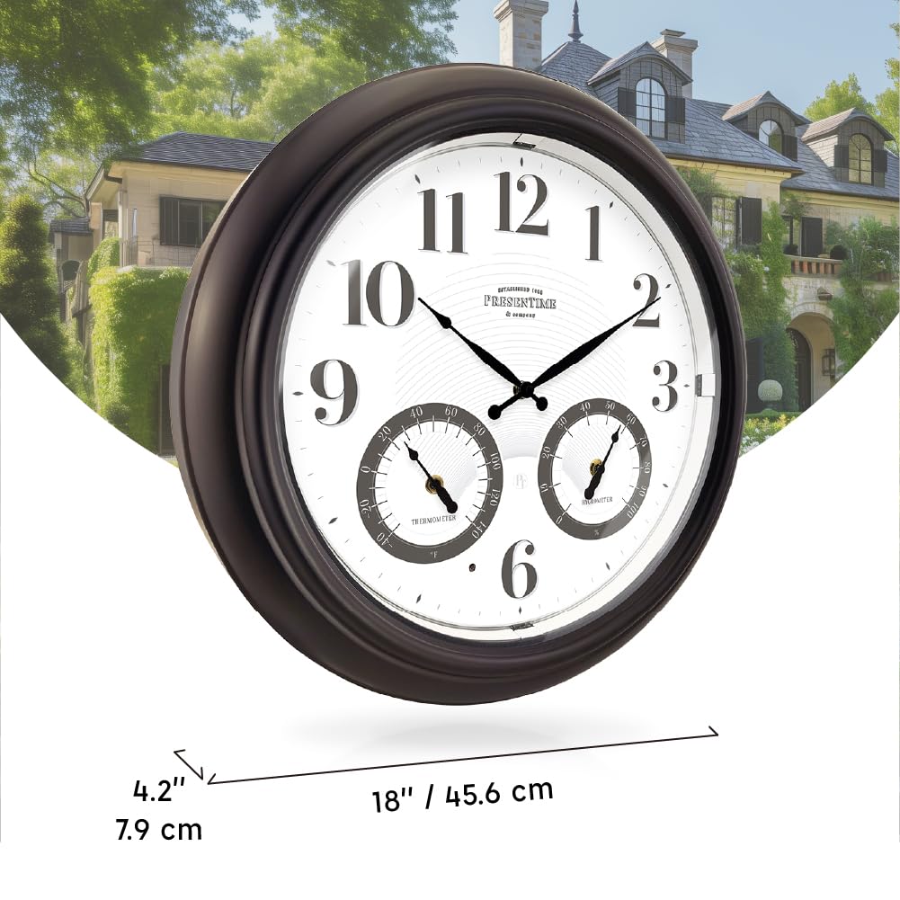 Presentime 18 Inch Outdoor Clock illuminated at night with garden lights