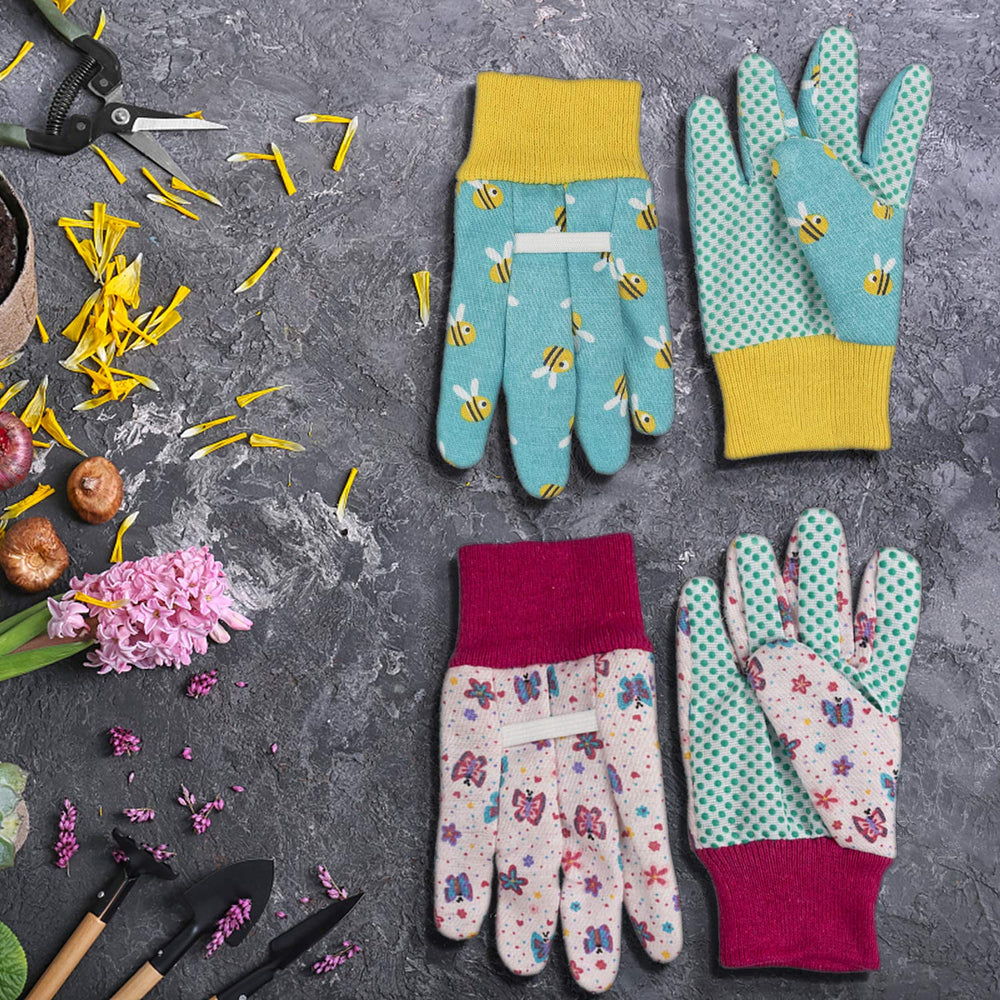 PROMEDIX P Kids Garden Gloves displayed with gardening tools