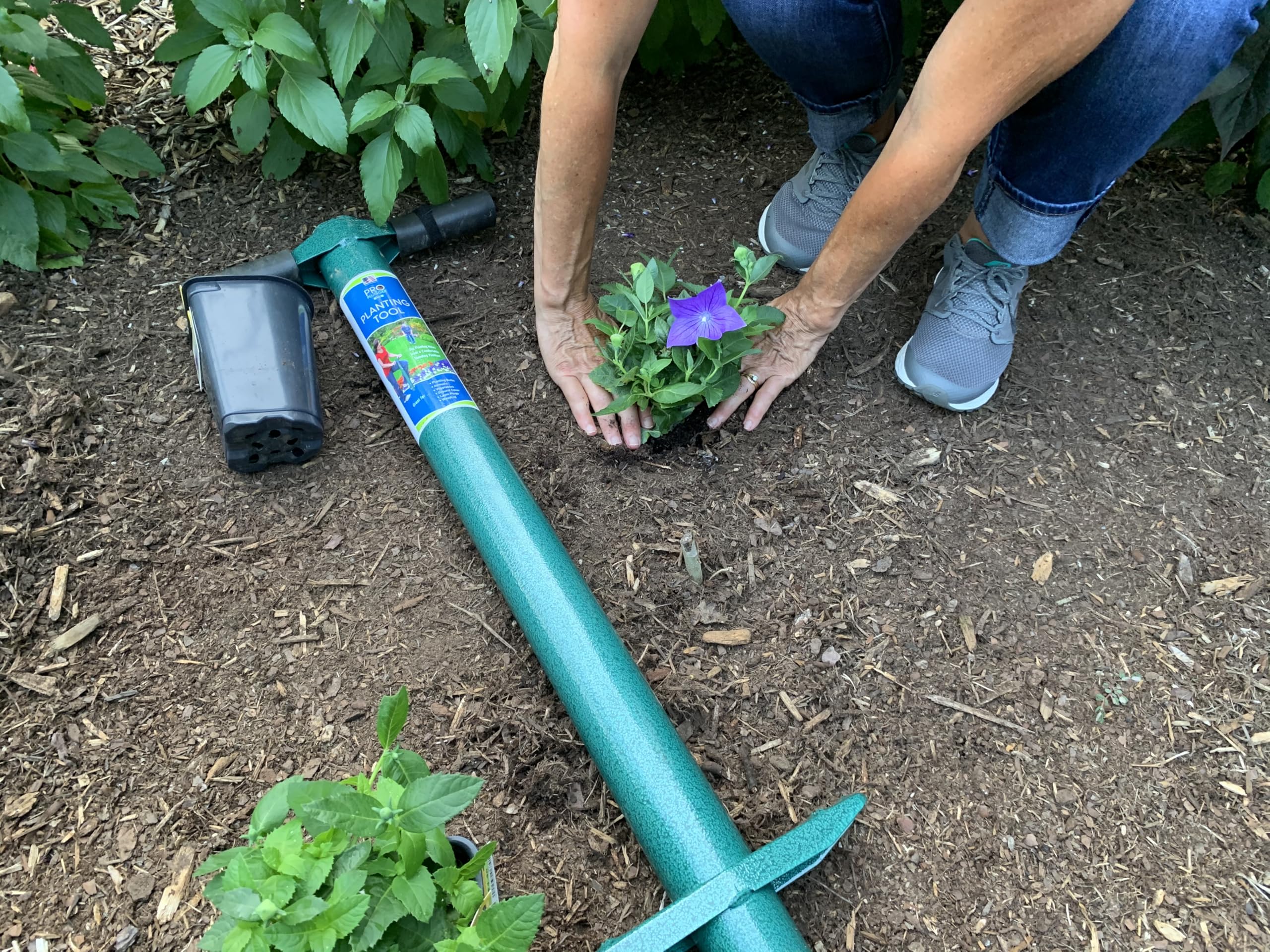 ProPlugger 5-IN-1 Lawn Tool close-up of hand grips