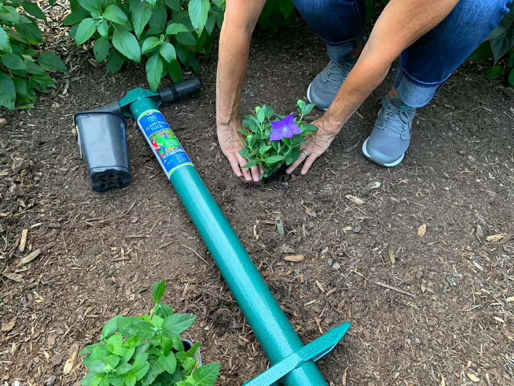 ProPlugger 5-IN-1 Lawn Tool close-up of hand grips