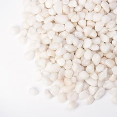 Pulovin white pebbles 3/8 inch size in a decorative display